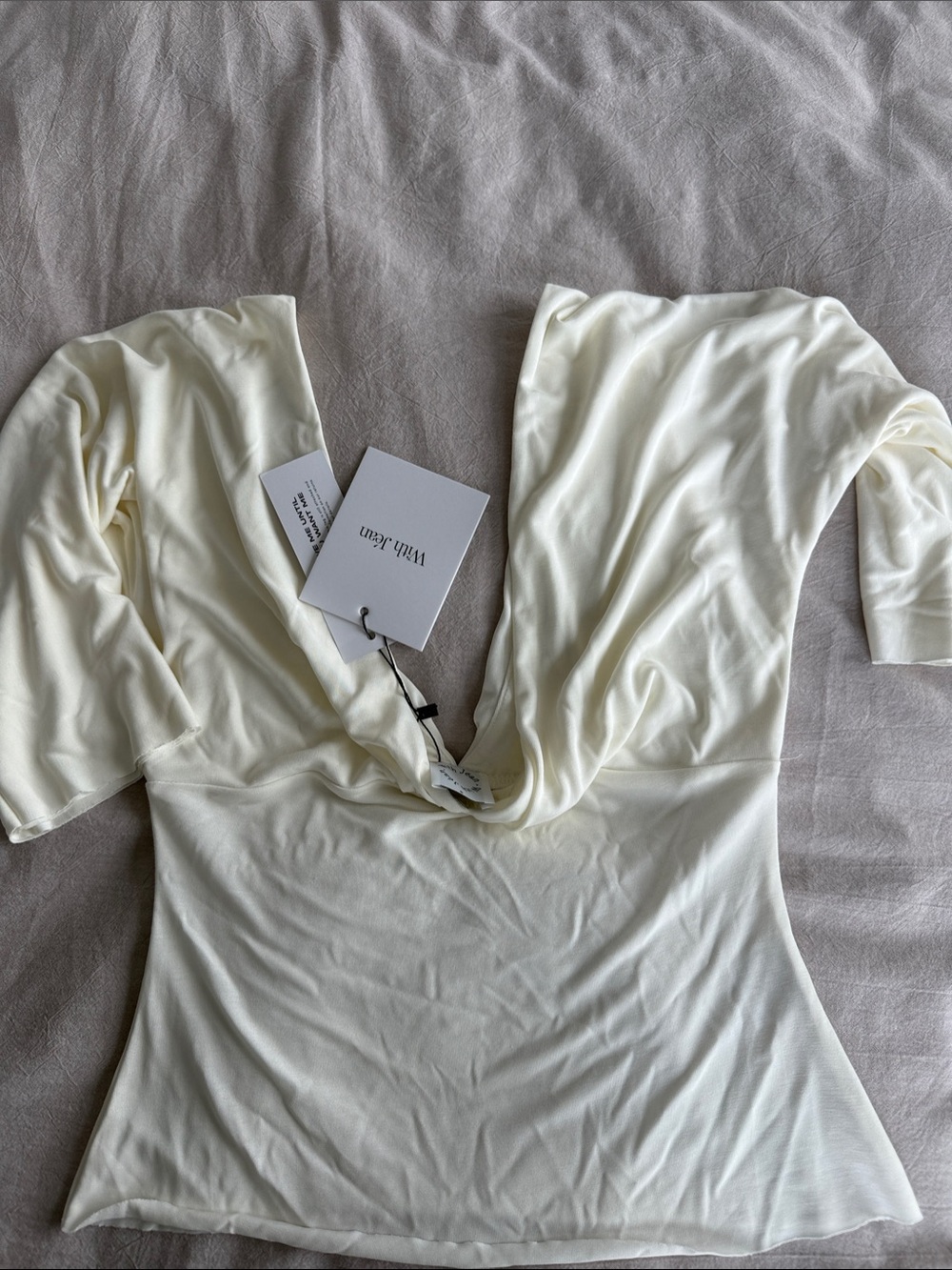 With Jean Cream Draped V-Neck Top